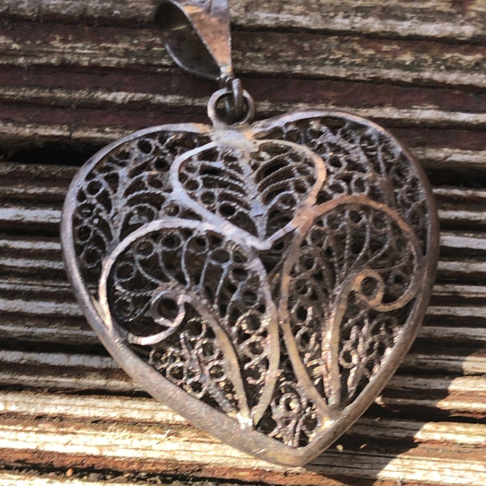 Sterling silver puffy filigree heart